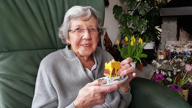 older lady with cake