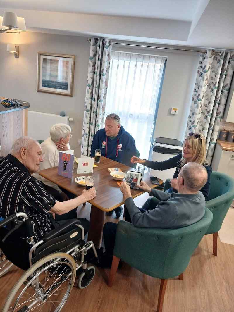 residents sat in our bar together enjoying a drink