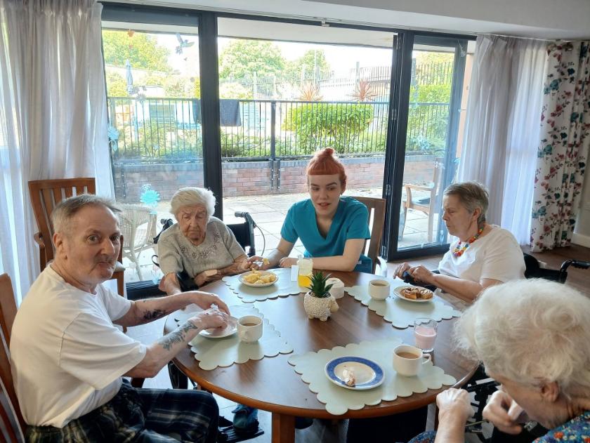 residents sat with carer